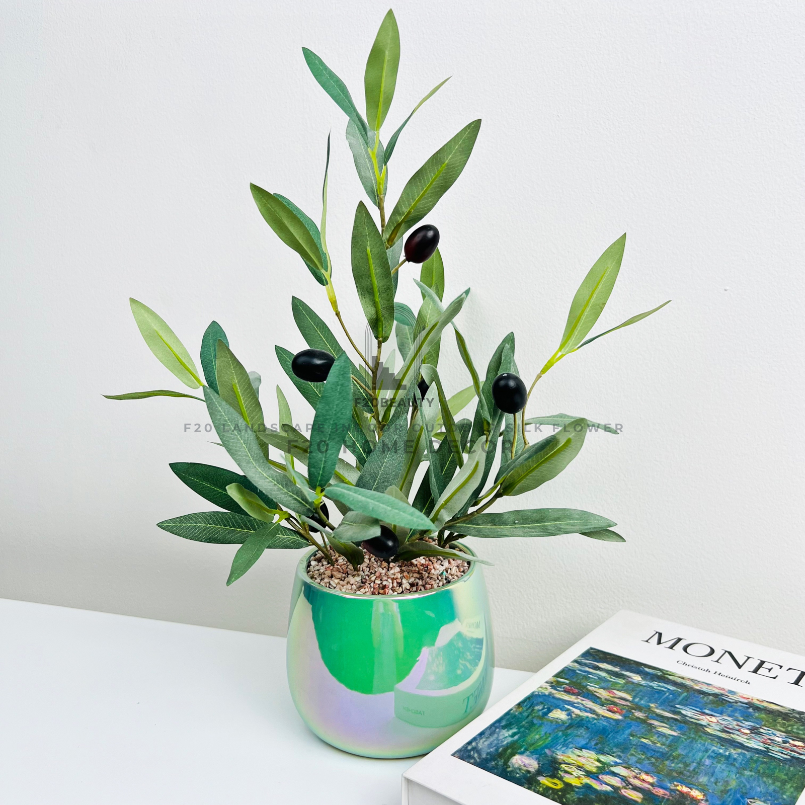 Chậu cây olive giả để bàn mang lại nét đẹp tinh tế cho không gian sống