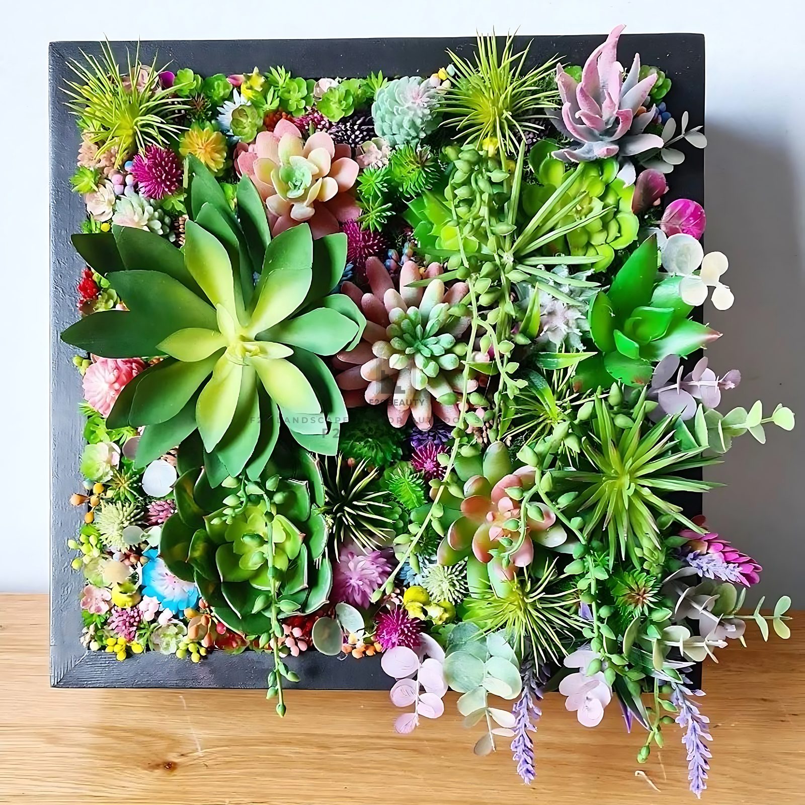 Tường cây giả sen đá mix các loại kết hợp đa dạng tọa nên không gian xanh mát