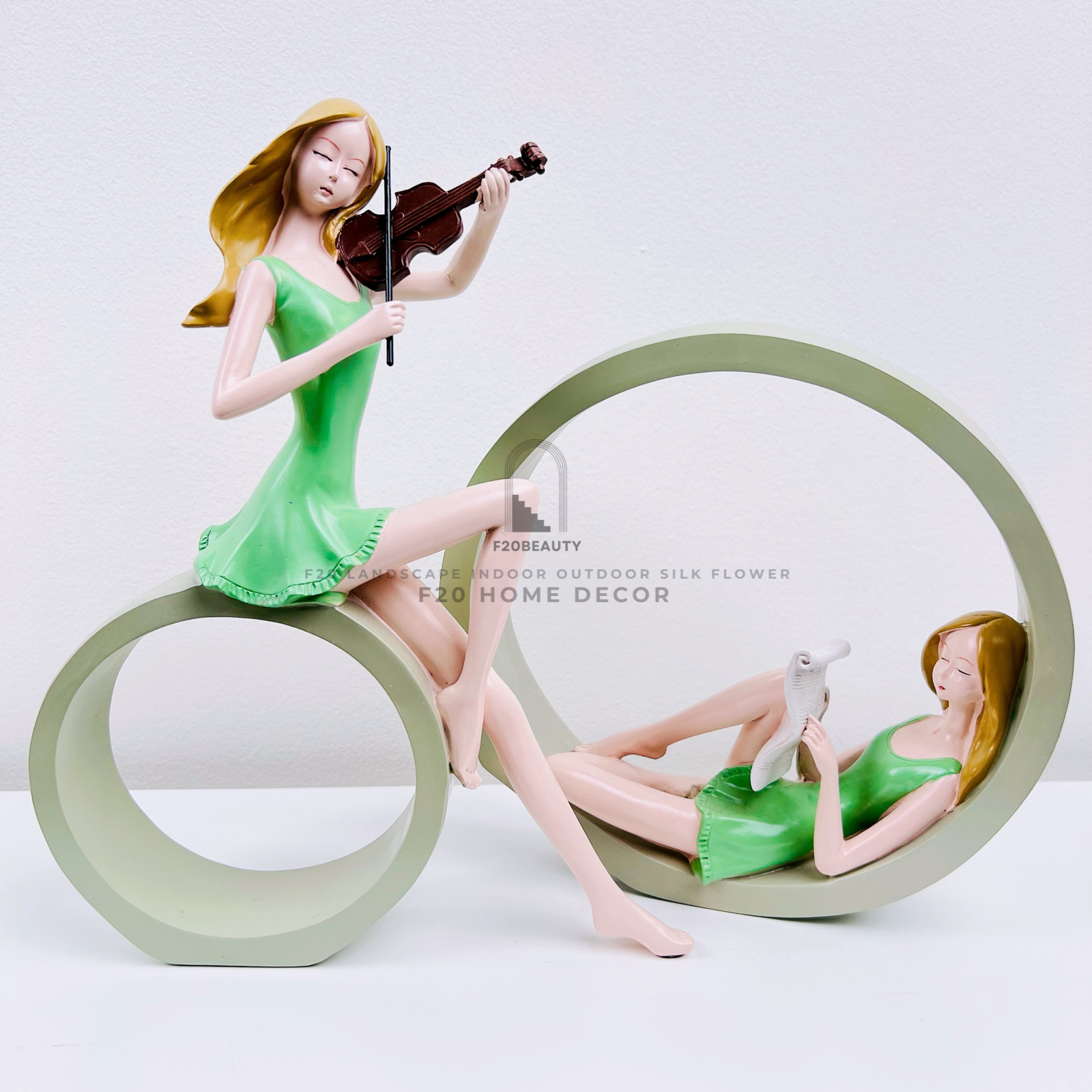 Tượng decor 2 cô gái đánh đàn