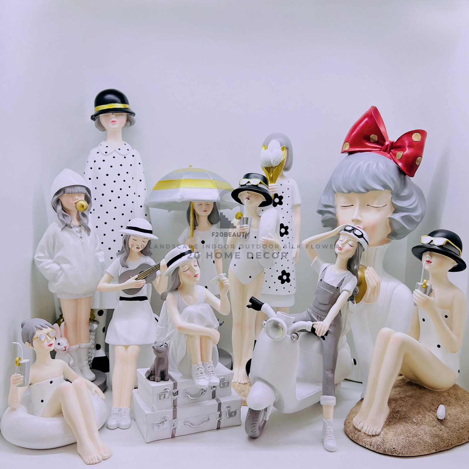 Tượng cô gái đáng yêu nhiều màu