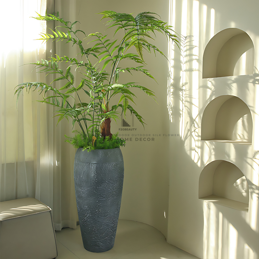 Cây dương xỉ cổ thụ giả trồng vào bình lu phong cách nhiệt đới