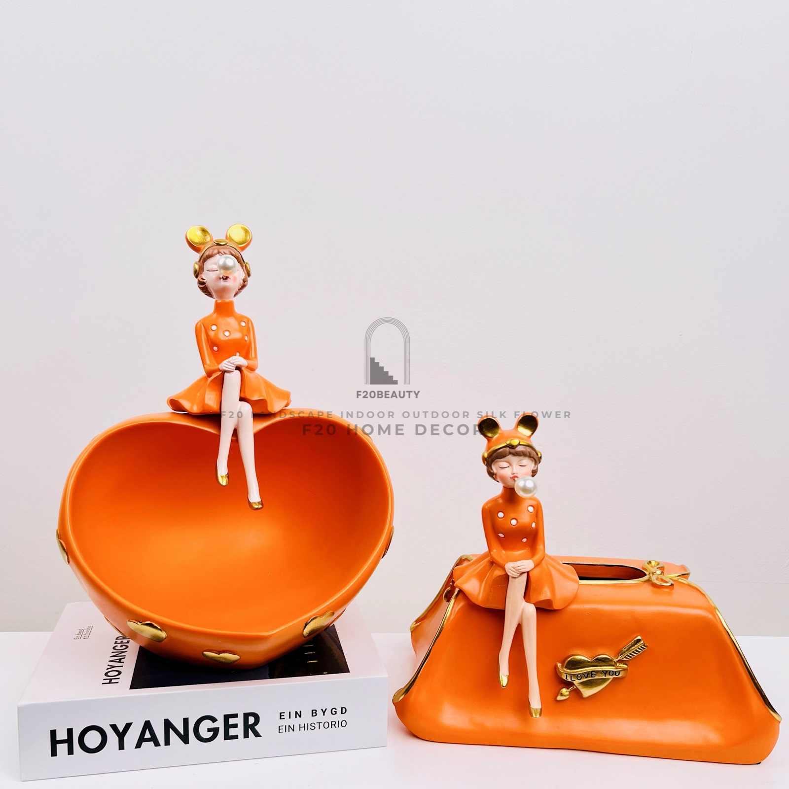 Tượng cô gái đựng khăn giấy, bánh kẹo màu cam trang trí phòng khách